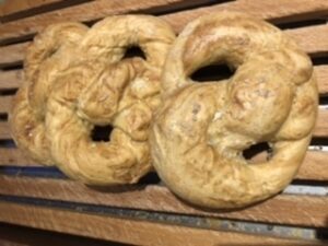 Pretzel on wooden bread board